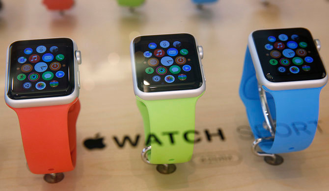 Apple Watches are displayed at an Apple Store in Hong Kong Friday, April 10, 2015. From Beijing to Paris to San Francisco, the Apple Watch made its debut Friday. Customers were invited to try them on in stores and order them online. (AP Photo/Kin Cheung)